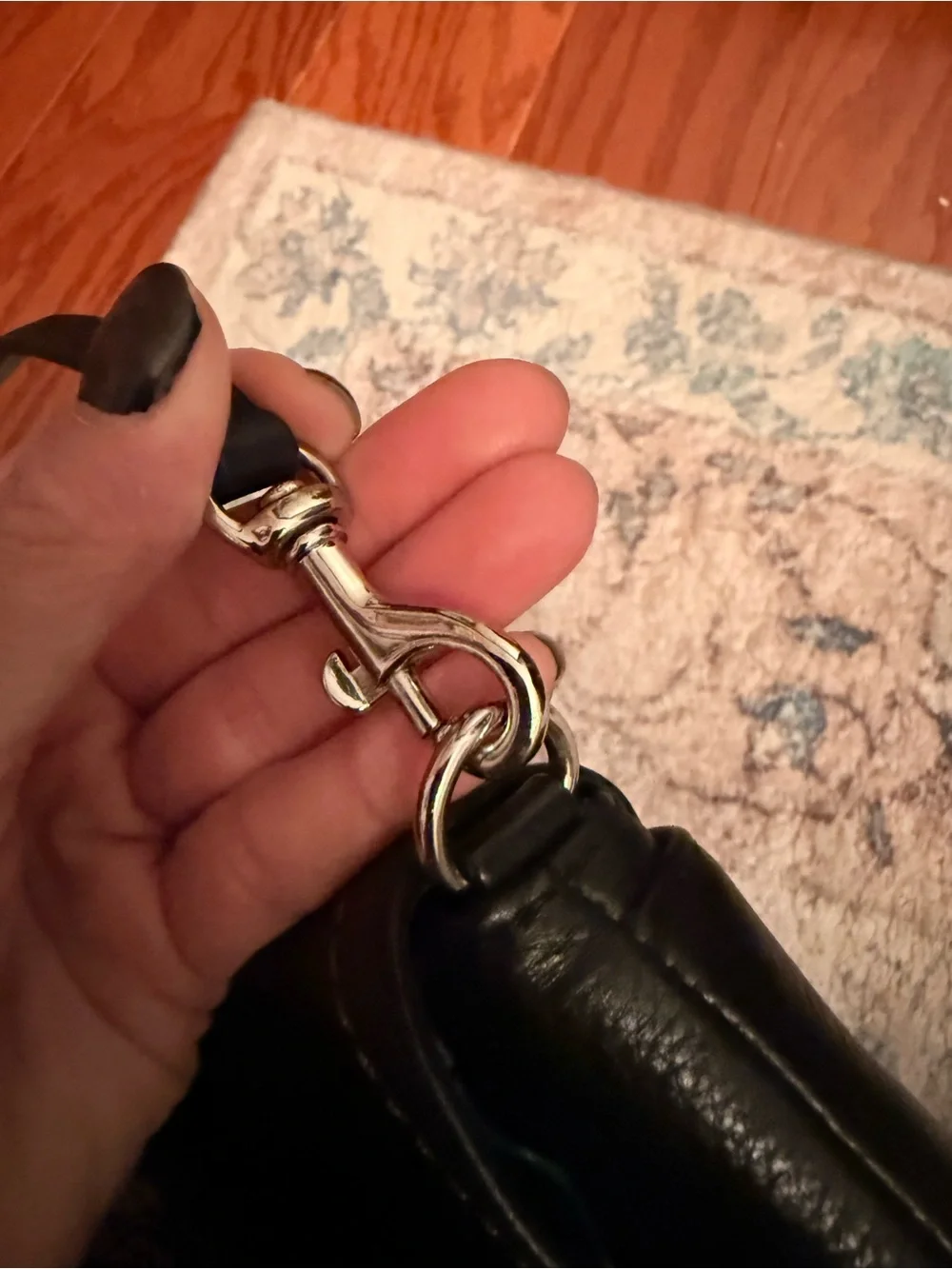 Black leather coach wristlet